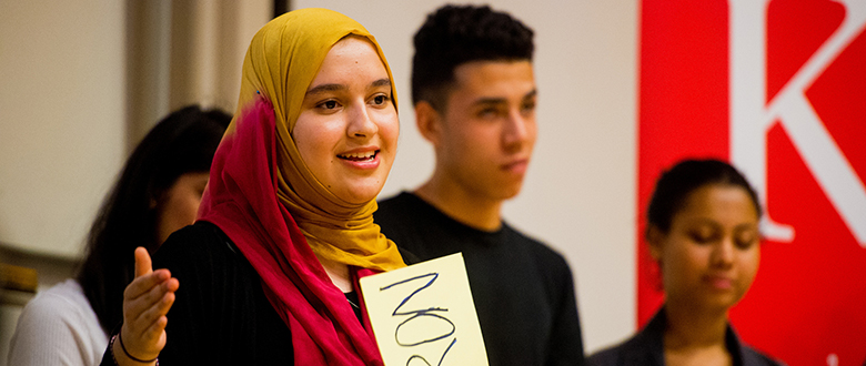 Students presenting at a K+ event