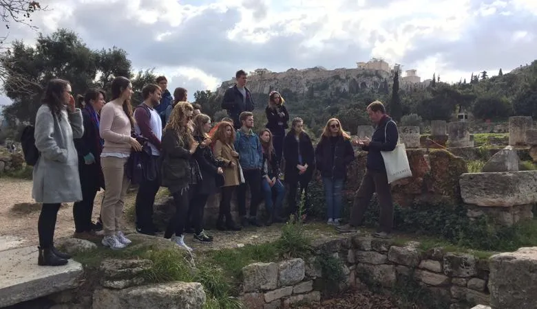Group of students and archeological di