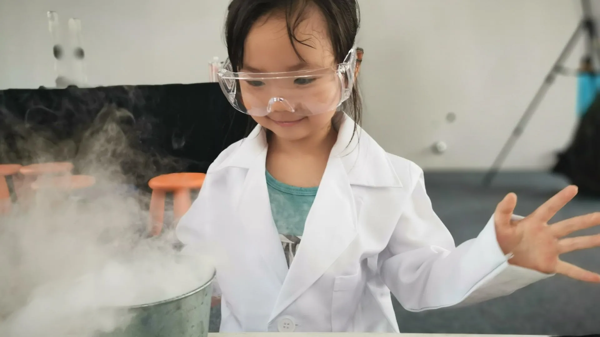 girl with glasses doing science - yy-teoh-2000x1100