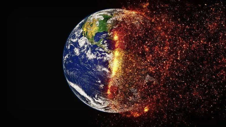 image of planet earth. righ-hand side of image depicts the planet in flames. 