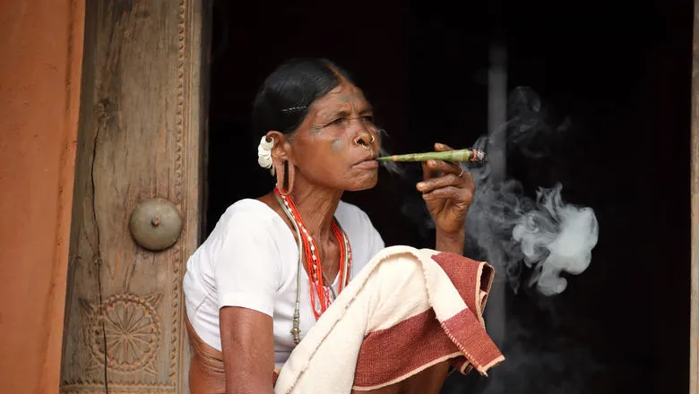 Unidentified Sora tribal woman in a rural village near Gunupur in Odisha, India. 