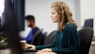 A female student on the computer