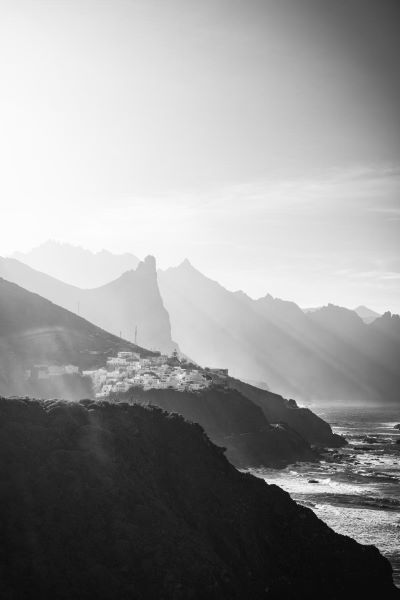 Black and white photograph of mountains in Tenerife across the horizon