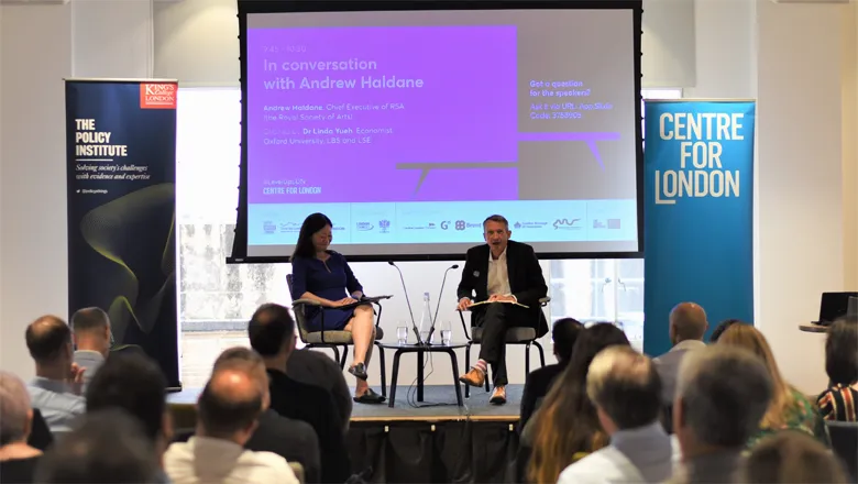 Andrew Haldane speaking at King's College London, with Linda Yueh moderating.