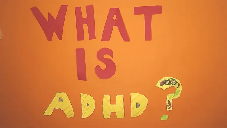 Paper-cut text displaying the words "what is ADHD?"