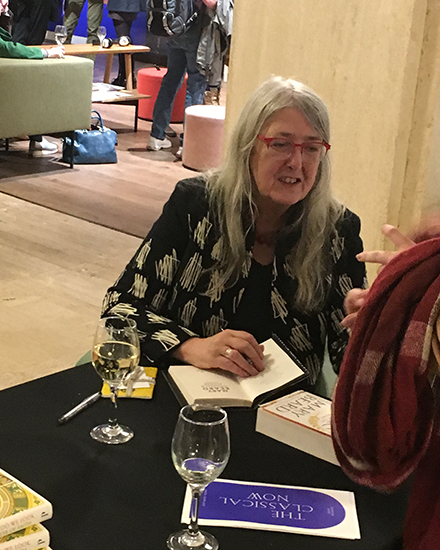 A photograph of Professor Mary Beard signing books at the Rumble Fund fifth annual lecture, held in March 2018