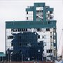 An image of a damaged high-rise office block after the 1996 Docklands bombing