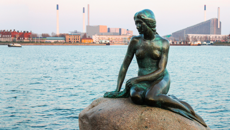 Picture of a mermaid sitting on a rock in the water in Copenhagen