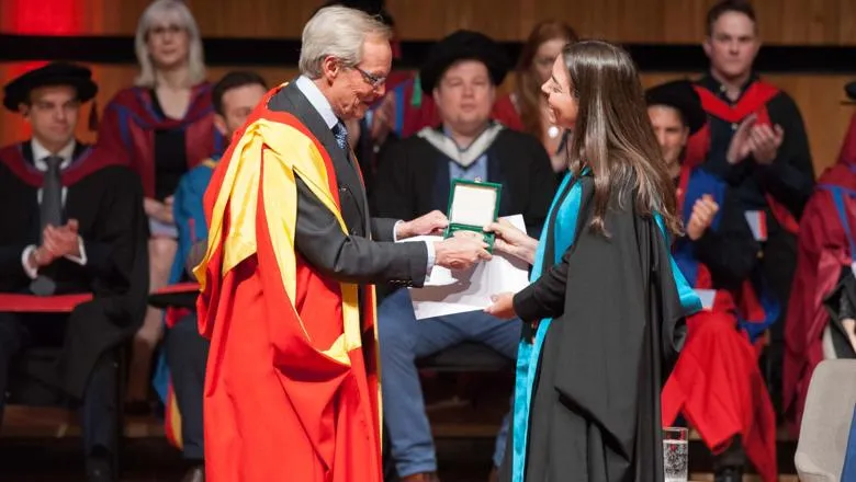 Joana Barata receives the Wellington Medal from Charles Wellesley, the 9th Duke of Wellington and former Chairman of the King's College London Governing Council