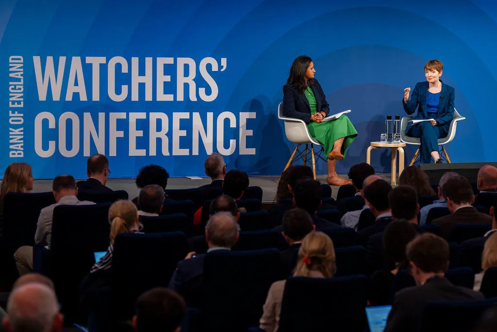 Rachana Shanhbogue (left) interviews Clare Lombardelli in front of a large audience