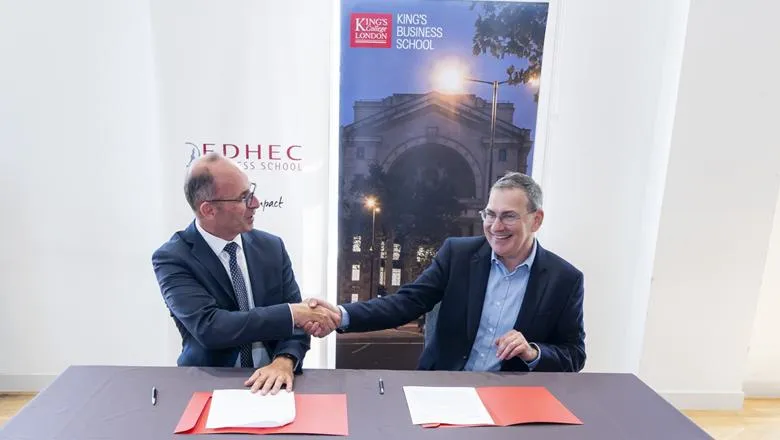 Emmanuel Métais and Professor Stephen Bach shake hands