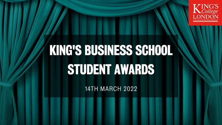Text reading 'King's Business School Student Awards' against the backdrop of curtains in a theatre