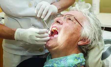 elderly patient dental front page puff