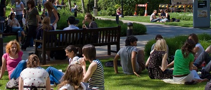 Students sitting outside on Guy's Campus, King's College London