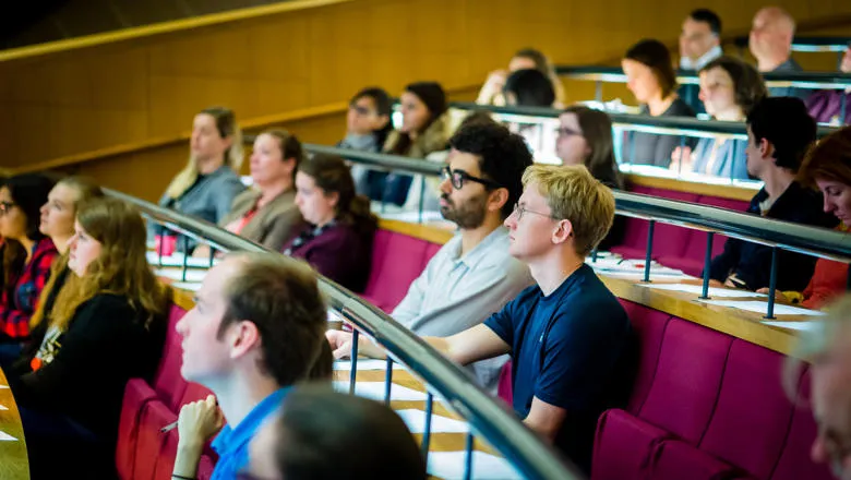 People sat in a lecture hall