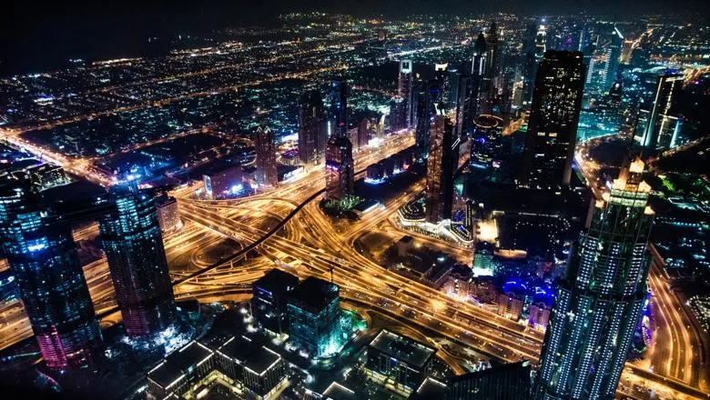 Timelapse photo of a busy city road network at night