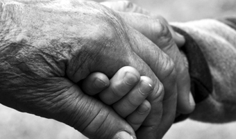 Grandparent and child hands