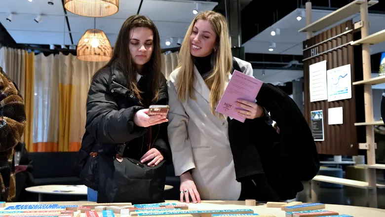 Students exploring exhibitions at the Science Gallery.
