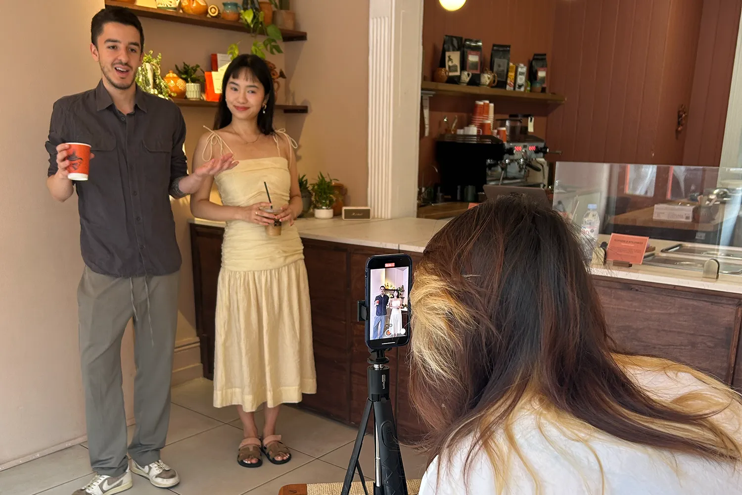 EI Intern, Petch, filming founders (Sarah and Bernardo) at Aguamiel