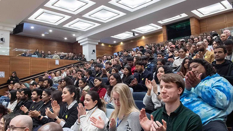 audience seated in auditorium