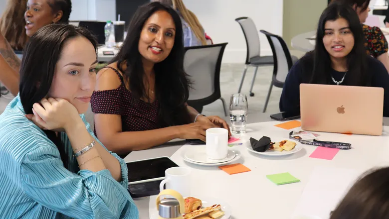 King's women entrepreneurs sitting at a table