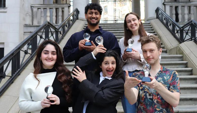 Idea Factory 2025 winners with trophies - Ubaid Tanzim, Claire Marianne Lyon, Dunia Mangal, Aya Safieddine and Mateusz Hess