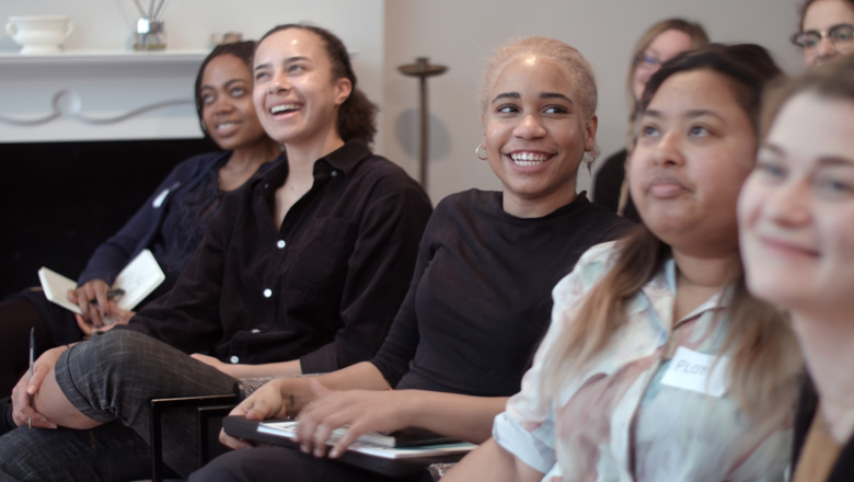 Group of women laughing at the Women Entrepreneurs Retreat 2023