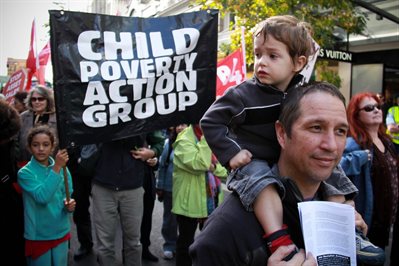 CPAG representatives on a demo in London with banner