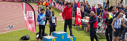 Image of Rob Sutherland collecting his bronze medal in the men's triple jump, 2016 BUCS Athletics Championships