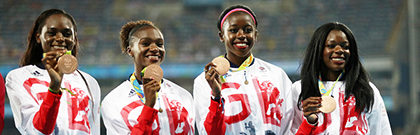 Image of King's student Dina Asher-Smith and relay team mates on the podium at the 2016 Rio Olympic Games