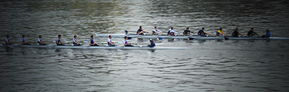 Image of UCL Men's Eight leading KCL Men's EIght in the final race at the 2016 Rowing Varsity