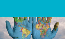 hands with world map painted on, blue banner across the top