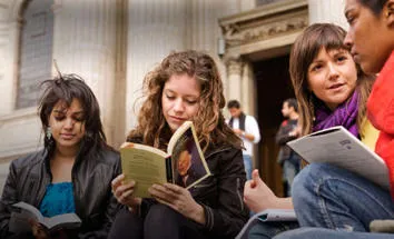 Students reading on campus