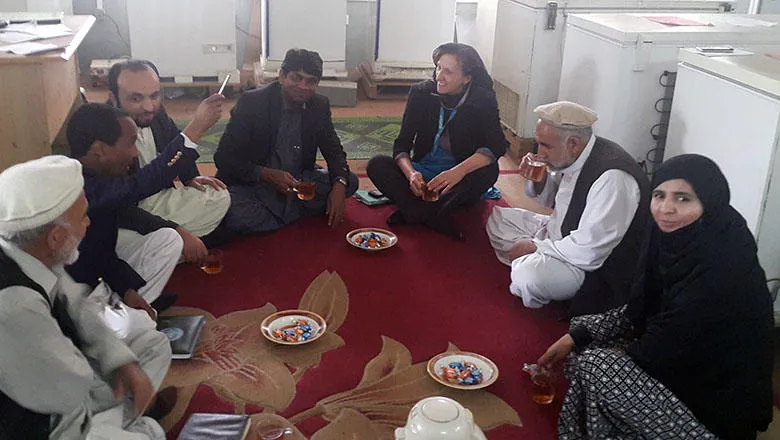 Professor Karen Edmond attends a community meeting in Afghanistan.