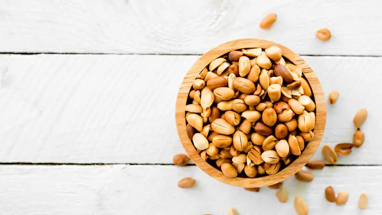 A bowl of peanuts.