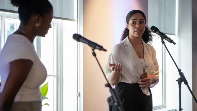 Tiarna Lee (left) and Jhanelle White (right) speaking at the launch