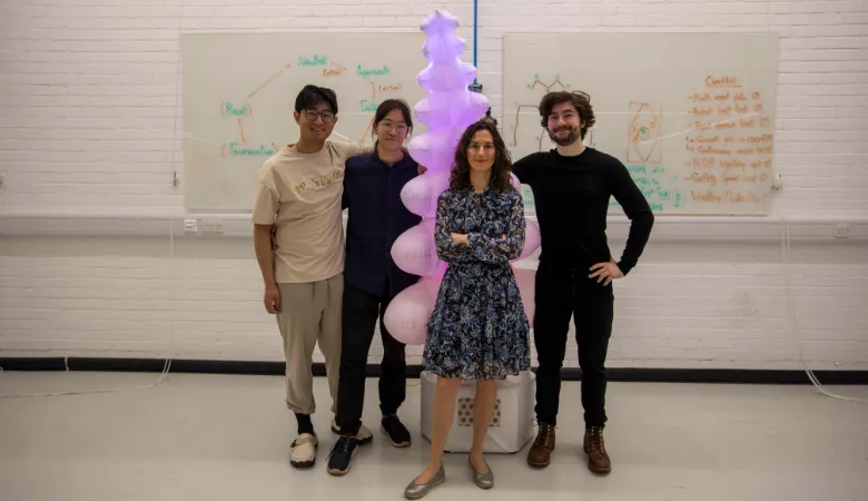 Sprout with Dr Oya Celiktutan and students in the Robotics Lab at King's. Photo by George Torode. 