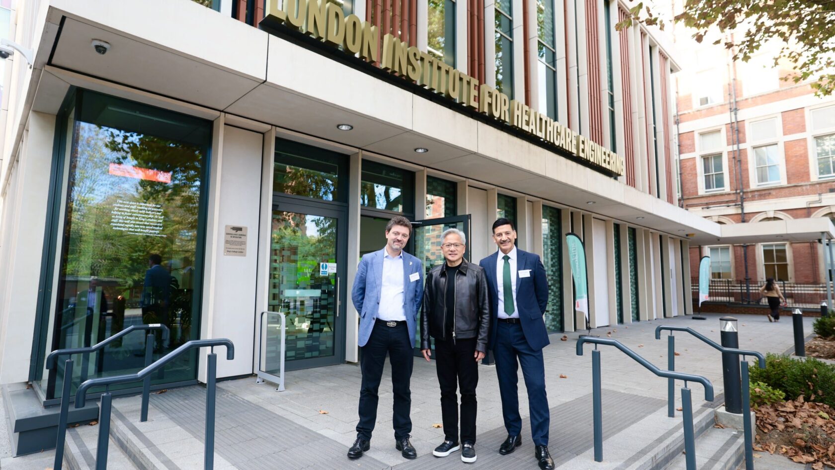 Professor Sir Bashir M. Al-Hashimi and Professor Sebastien Ourselin welcoming Jensen Huang to LIHE.