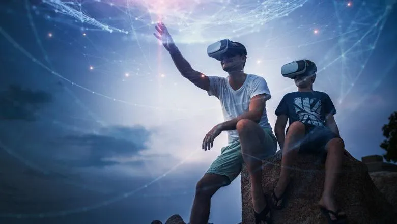 Two boys wearing VR headsets