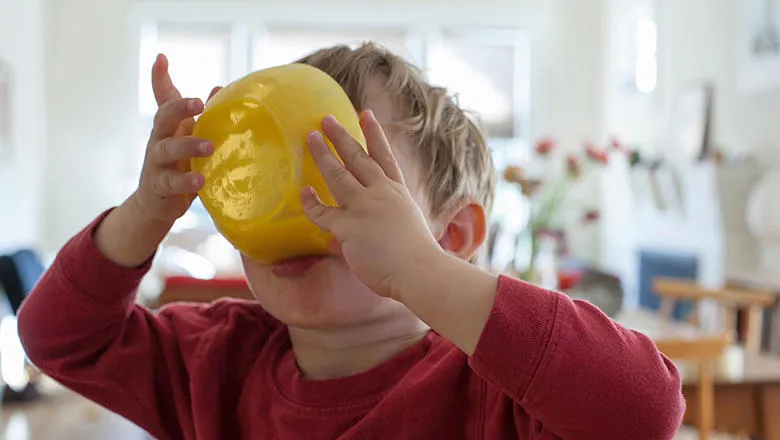 A child eating breakfast.