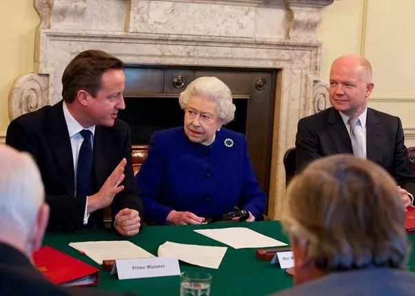 Queen Elizabeth II with former Prime Minister David Cameron