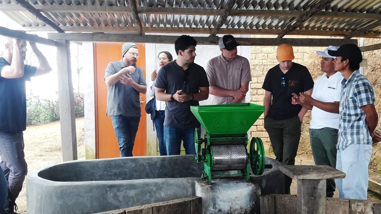 Jonathan visiting coffee farms with Californian coffee buyers in Cajamarca, Peru