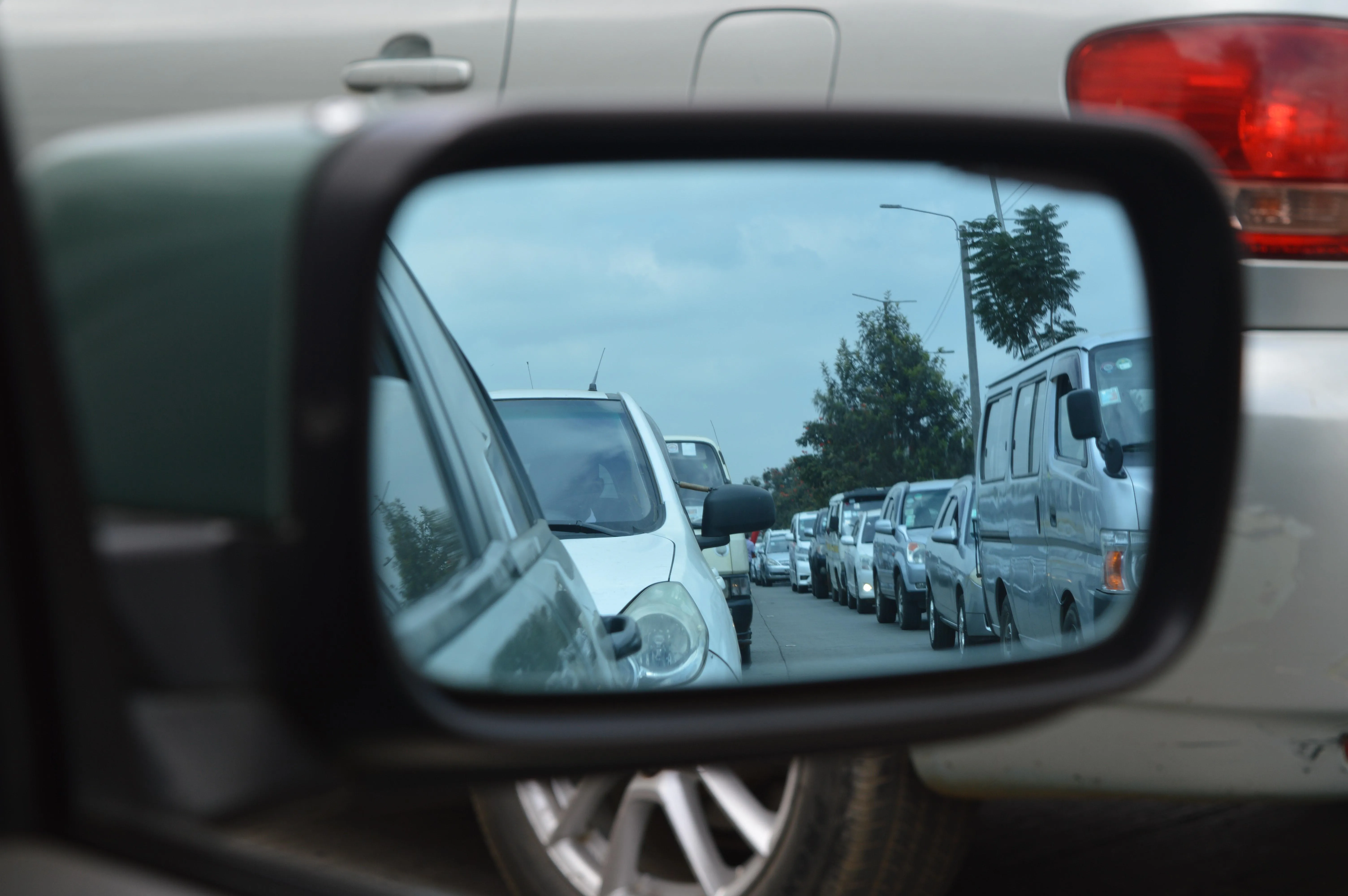 Cars in a wing mirror
