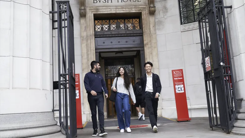3students_smiling_Bush_House_North