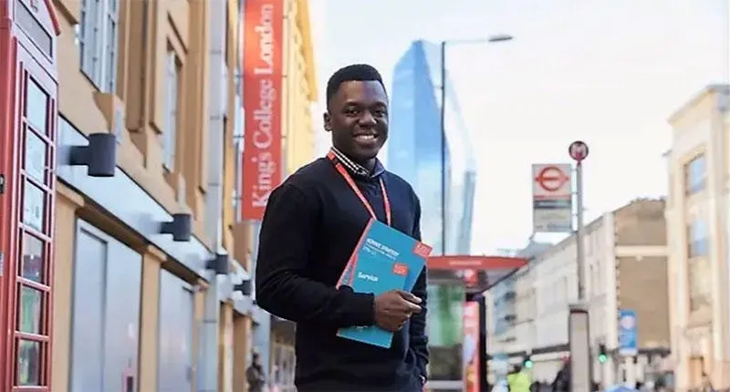 A male staff member standing outside Waterloo Campus.