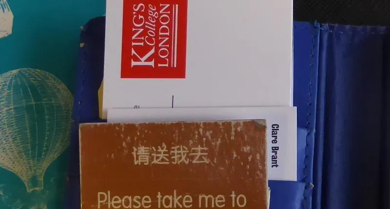 Image of papers, one with the King's College London logo