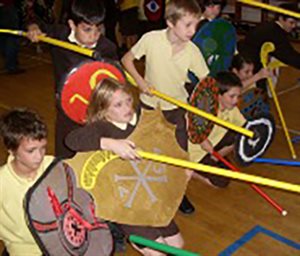 Kids playing greek chariot