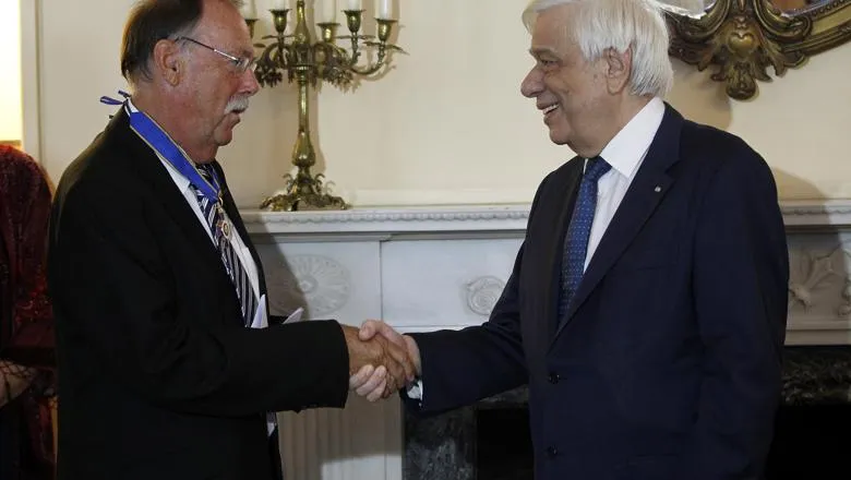 Professor Beaton shakes hands with the President of the Hellenic Republic