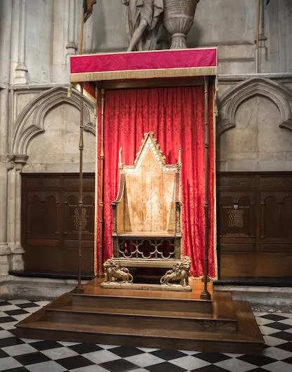 The image shows St Edward's Chair, famously known as the Coronation Chair.