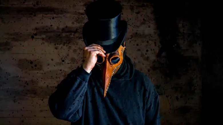 Photo of man wearing a mask